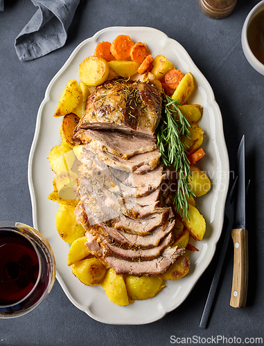 Image of freshly baked sliced pork neck roast