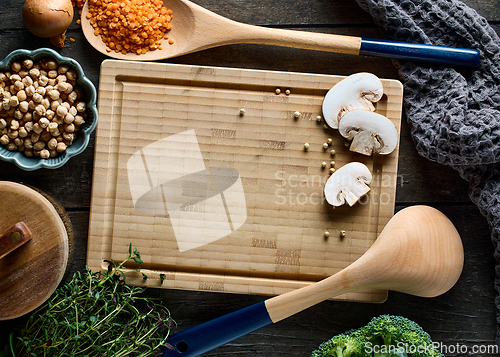 Image of cooking tools on wooden table