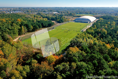 Image of Aerial View of Sports Complex and Forest
