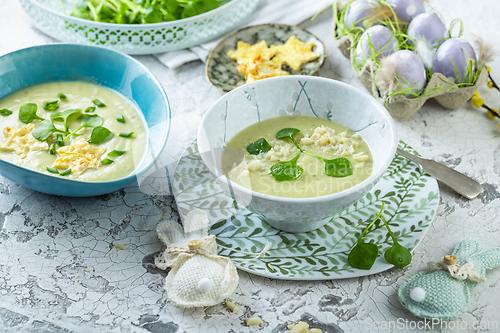 Image of Fresh vegetable detox soup made of green vegetables and herbs with purslane