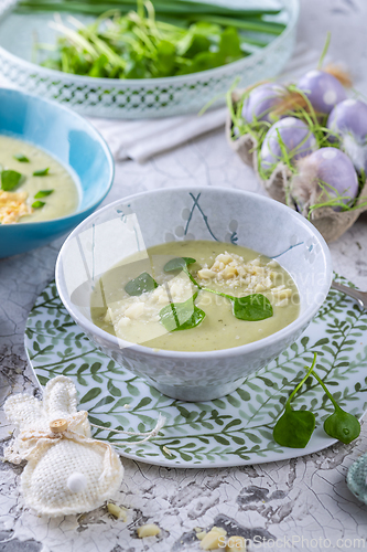 Image of Fresh vegetable detox soup made of green vegetables and herbs with purslane