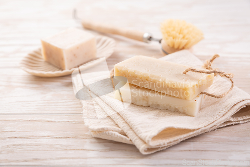 Image of Handmade natural soaps on beige background