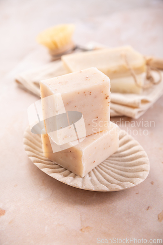 Image of Handmade natural soaps on beige background