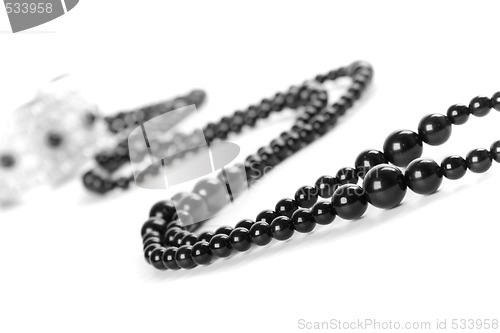 Image of bracelet and black necklace