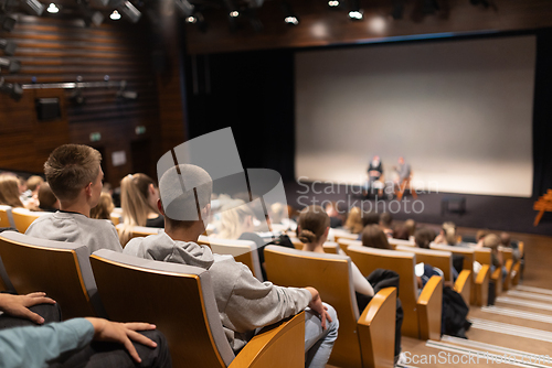 Image of Interview and round table discussion at business convention and presentation. Audience at the conference hall. Business and entrepreneurship symposium