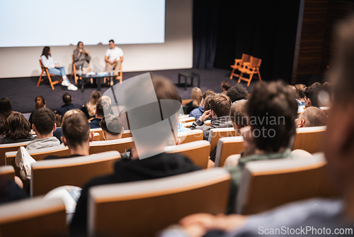 Image of Interview and round table discussion at business convention and presentation. Audience at the conference hall. Business and entrepreneurship symposium