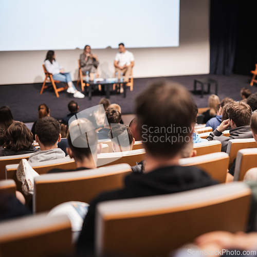 Image of Interview and round table discussion at business convention and presentation. Audience at the conference hall. Business and entrepreneurship symposium
