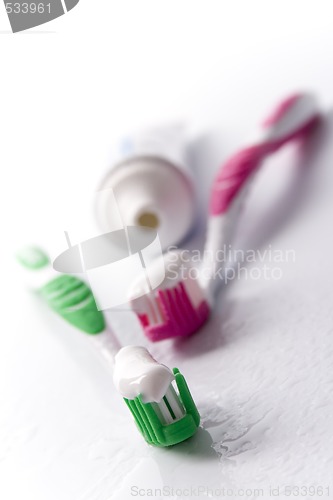 Image of toothpaste and toothbrushes