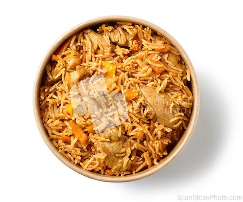Image of take away box of spicy rice with chicken meat and carrots