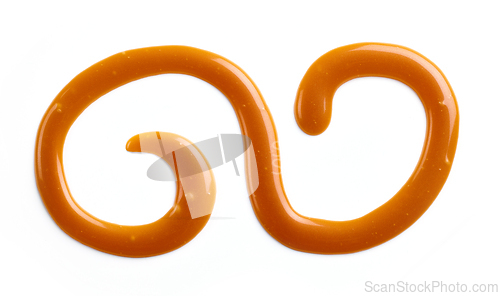 Image of caramel sauce on white background