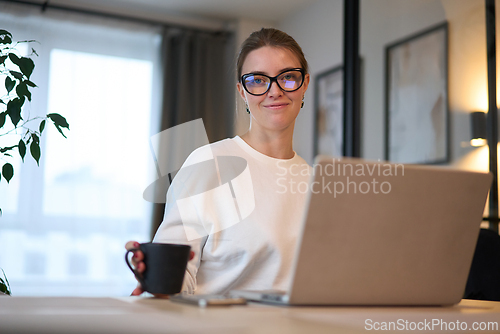 Image of Relaxed Confidence While Working from Home