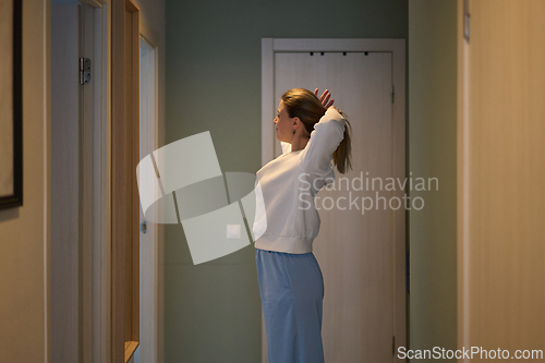 Image of Calm Preparation in a Quiet Hallway Before the Day Begins