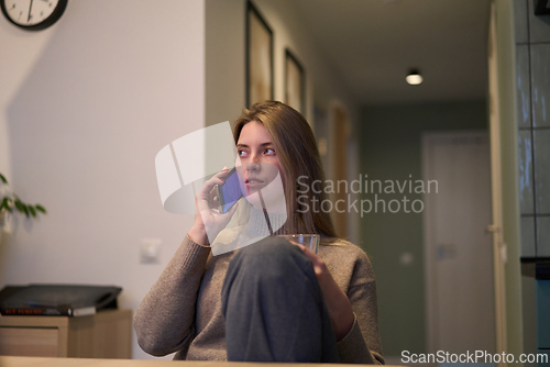 Image of Relaxed Conversation with a Glass of Water in Hand