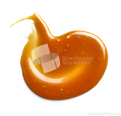Image of caramel sauce on white background