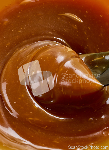 Image of freshly cooked caramel sauce background