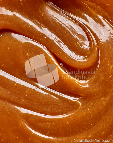 Image of freshly cooked caramel sauce background
