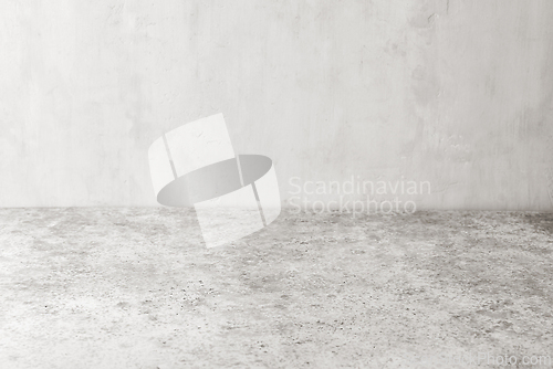 Image of light grey table and wall