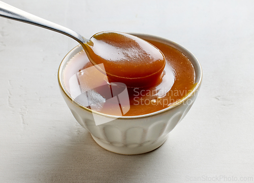 Image of bowl of freshly cooked homemade caramel sauce