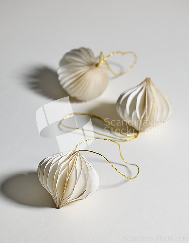 Image of white paper Christmas ornaments