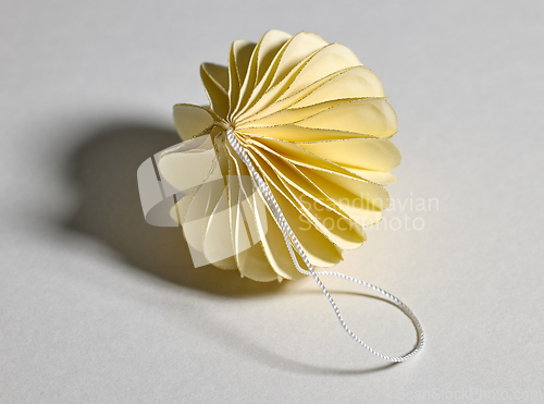 Image of yellow paper Christmas ornament