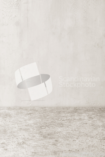 Image of light grey table and wall