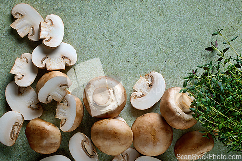 Image of fresh mushrooms on green background