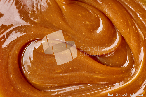 Image of freshly cooked caramel sauce background