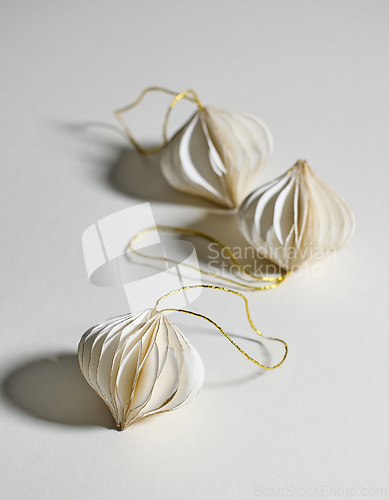 Image of white paper Christmas ornaments