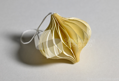 Image of yellow paper Christmas ornament