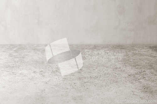 Image of light grey table and wall