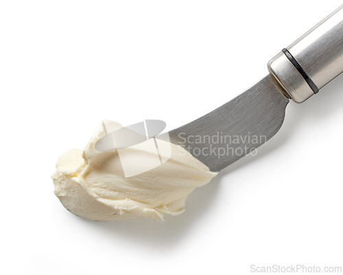 Image of fresh cream cheese on knife