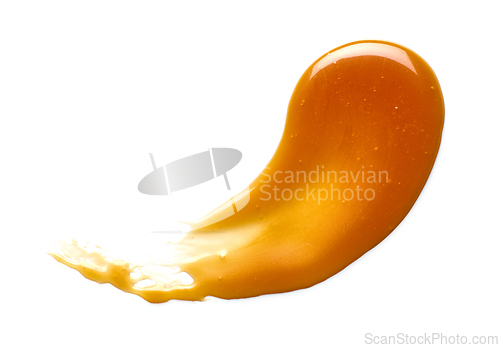Image of caramel sauce isolated on white background