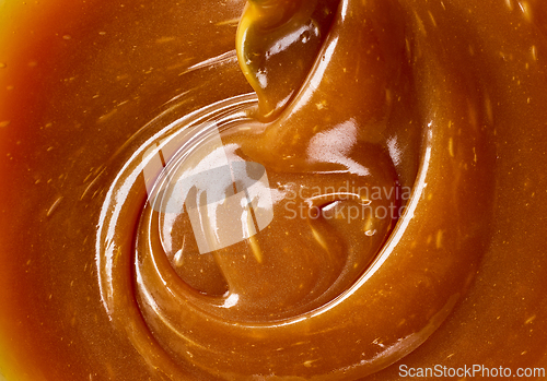 Image of freshly cooked caramel sauce background