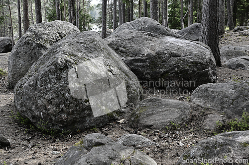 Image of large stones boulders in a deep forest 