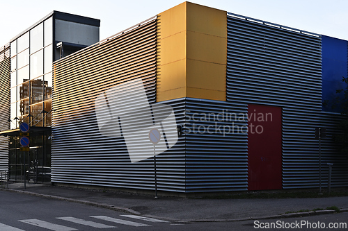 Image of Modern industrial building with colorful panels exterior