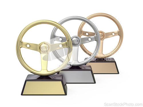 Image of Gold, silver and bronze steering wheel trophies
