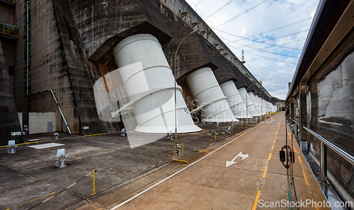 Image of Impressive scale of the turbine discharge area at the Itaipu Dam complex Itaipu Binacional, Brazil