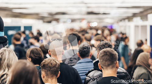 Image of Abstract blurred people at exhibition hall of expo event trade show. Business convention show or job fair. Business concept background.