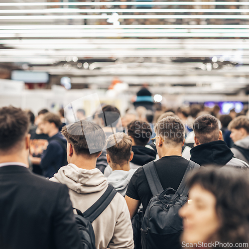 Image of Abstract blurred people at exhibition hall of expo event trade show. Business convention show or job fair. Business concept background.
