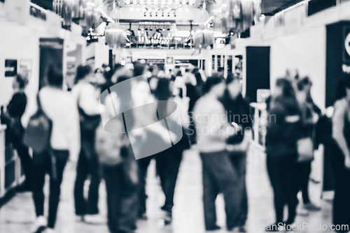 Image of Abstract blurred people at exhibition hall of expo event trade show. Business convention show or job fair. Business concept background. Black and white