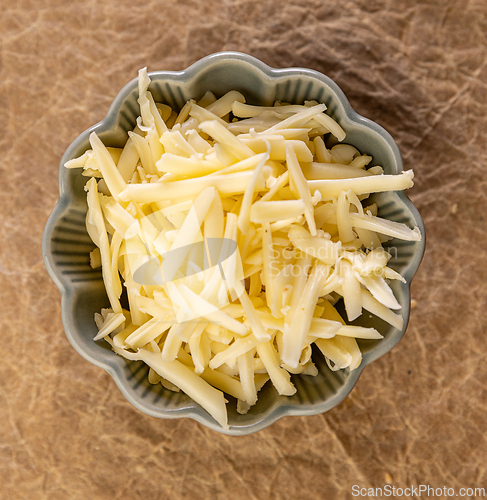 Image of Shredded cheese waiting in a bowl