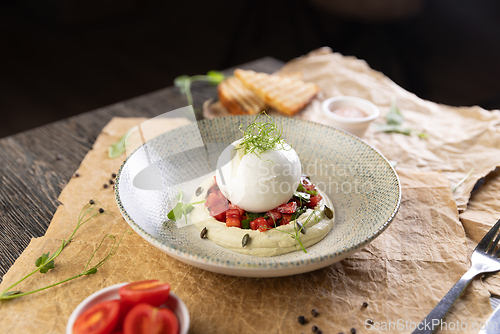 Image of Burrata cheese with fresh tomatoes