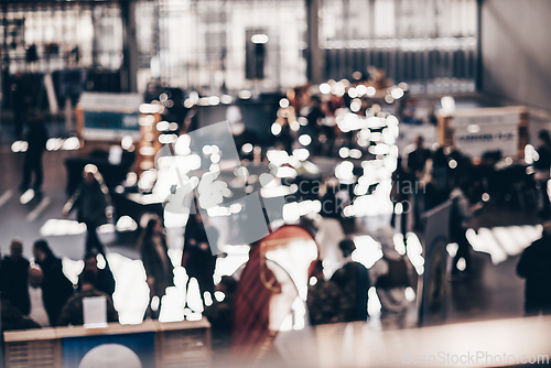 Image of Abstract blurred people at exhibition hall of expo event trade show. Business convention show or job fair. Business concept background.