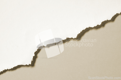 Image of beige color torn paper background