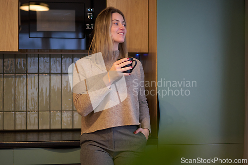 Image of Warm Pause in the Kitchen with a Quiet Smile