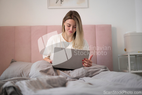 Image of Focused Morning Work from the Comfort of Bed