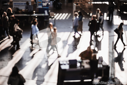 Image of Abstract blurred people at exhibition hall of expo event trade show. Business convention show or job fair. Business concept background.