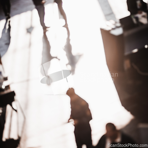 Image of Abstract blurred people at exhibition hall of expo event trade show. Business convention show or job fair. Business concept background.
