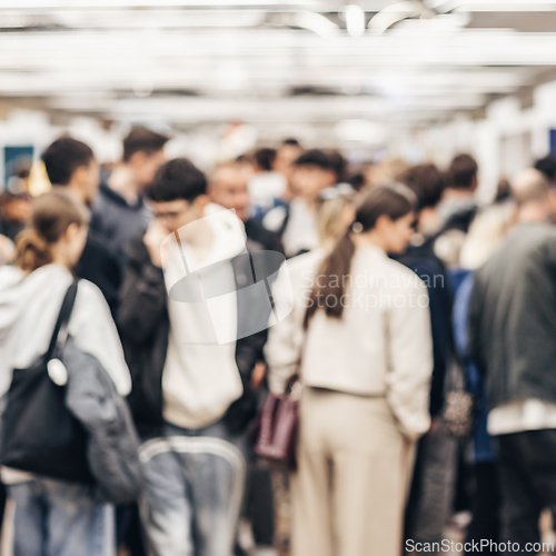 Image of Abstract blurred people at exhibition hall of expo event trade show. Business convention show or job fair. Business concept background.