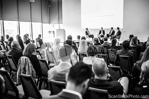 Image of Interview and round table discussion at business convention and presentation. Audience at the conference hall. Business and entrepreneurship symposium